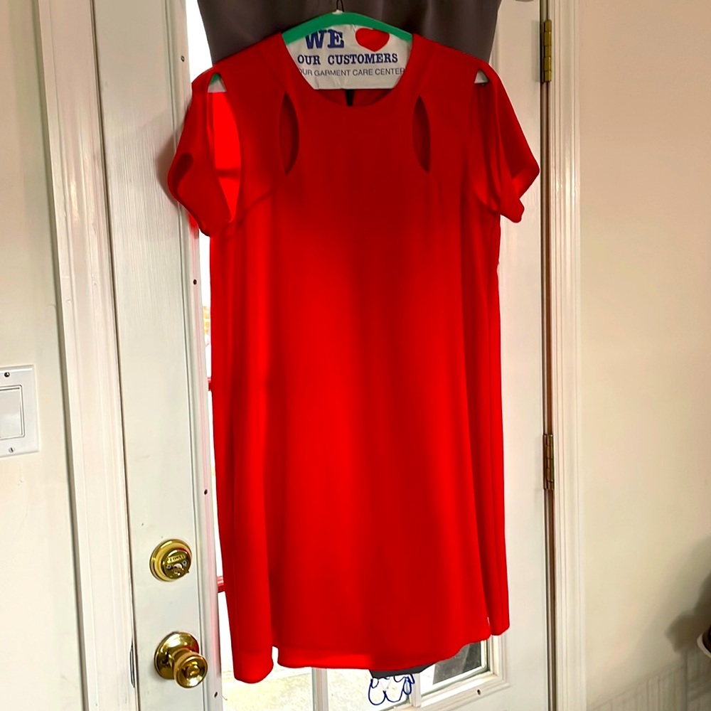 BCBG Maxazria red short sleeve cocktail dress with cut outs